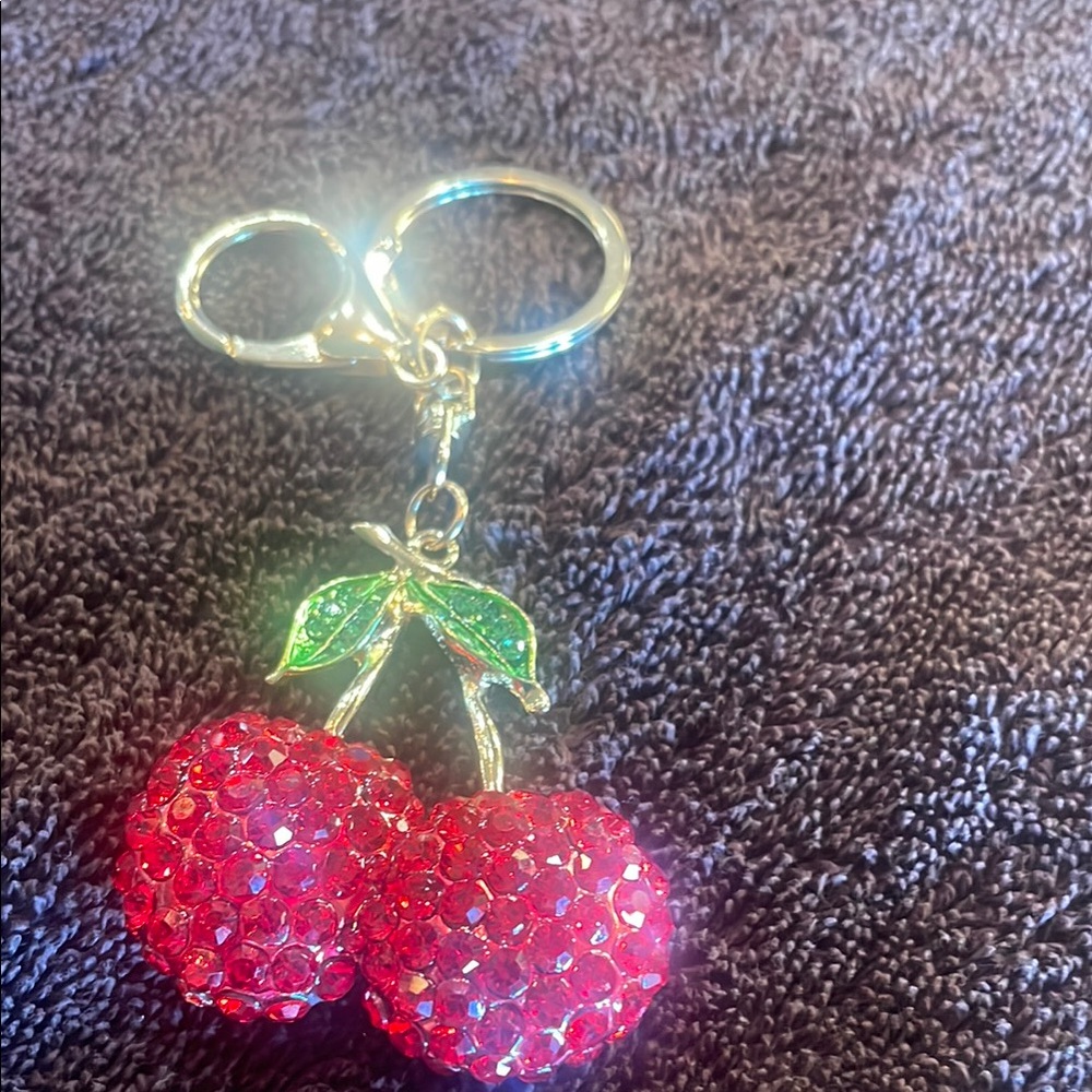 Sparkling Cherry Keychain New 5” key chain.  Charm is 2 1/2” x 2 1/2”